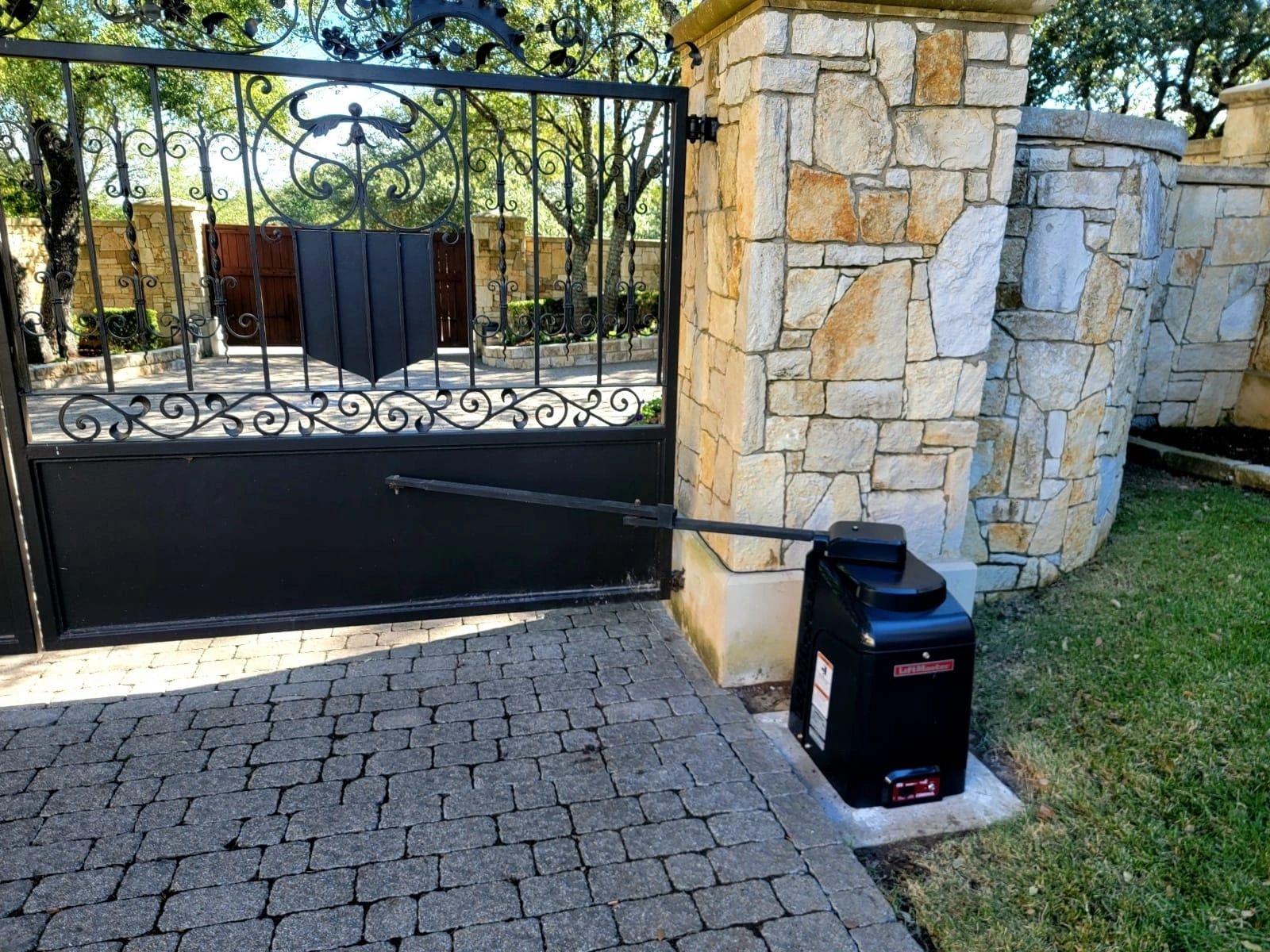 Gate operator and security system installation